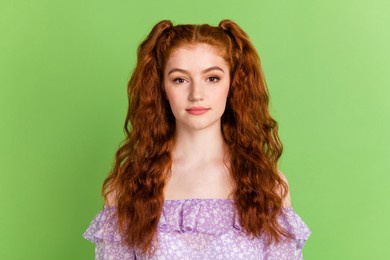 photo of calm ginger hairstyle young lady wear violet blouse isolated on green color background