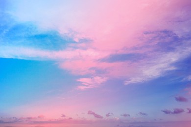 a beautiful neon pink and blue sky with clouds. a cloudscape from fancy dreams.