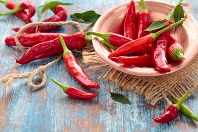 chili peppers in a copper plate. 