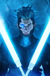 warrior of the future. a brave cyberpunk warrior in protective uniform stands and looks at camera on alert in neon light. game, virtual reality.