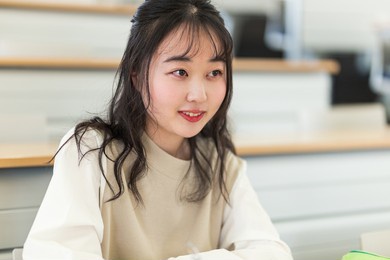 university students taking lectures in the lecture room