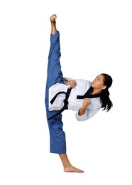 karate taekwondo teenager girl practice fighting kick and high leg on black belt level. asian youth athlete woman wear sport traditional uniform over white background full length isolated