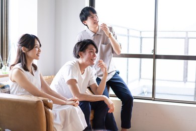 young men and women having fun at a sports game