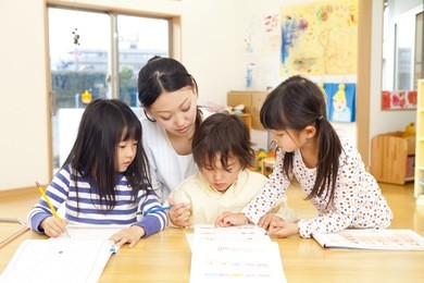 nursery and three children educating intellectual drilling
