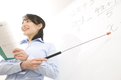 a teacher teaching at an institute