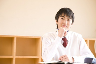 a middle school boy taking a class