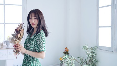 young asian woman holding bouquet. beauty concept. skin care. body care. 