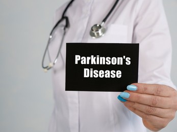 healthcare concept meaning parkinson's disease with inscription on the piece of paper.