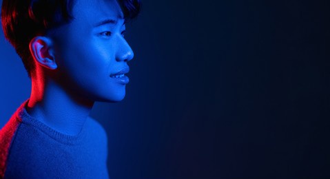 asian man banner futuristic neon light blue