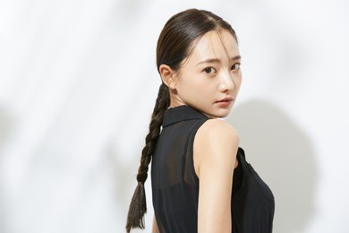 beauty portrait of a young asian woman in a black dress