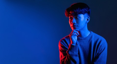 thoughtful man idea banner bright blue neon light