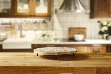 wooden desk of free space and kitchen interior. pedestal for your product. 