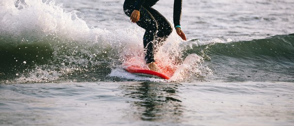 surfer woman practice surfing in the white water