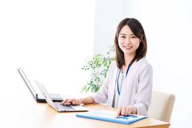 young businesswoman doing paperwork in the office