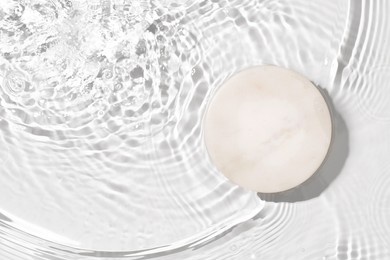 transparent and clean white water background with podium sunlight reflection, top view, beauty backdrop, mock up