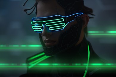 cyberpunk concept. close-up portrait of a cyberpunk warrior wearing a mask and glasses in green neon night light. world of the future. game, virtual reality.