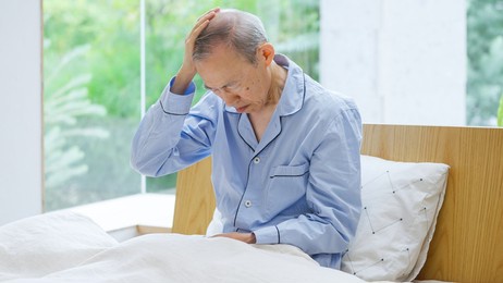 asian senior man who is sick