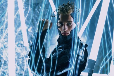 cyberpunk concept. portrait of a handsome cyberpunk warrior wearing a cyber mask and outfit in neon lights. world of the future. game, virtual reality.