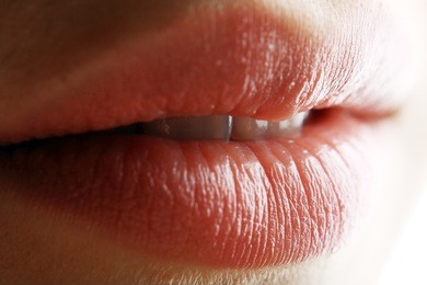 close-up portrait of juicy flirty feminine mouth 