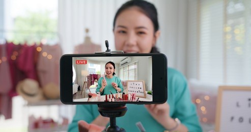 asia woman micro influencer record live viral video camera at home studio. happy fun talk speak advice review hobby in media. vlogger selfie shoot enjoy work show smile teach like share app.