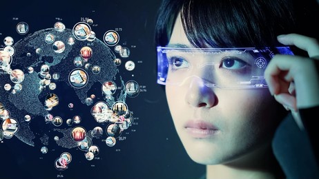 young asian woman watching vr graphics with smart glasses.