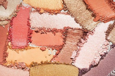 eye shadow multi colored brown beige, orange, golden, pink smudge loose gray isolated background