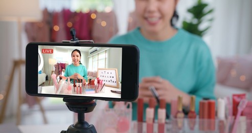 asia woman micro influencer record live viral video camera at home studio. happy fun talk speak advice review hobby in media. vlogger selfie shoot enjoy work show smile teach like share app.