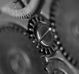 metal gear wheel,black-and-white, rather unique macro photo, for your successful business design.  macro . extreme closeup