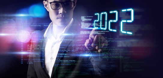 digital technology 2022 new year background, businessman hand finger pointing mission vision business digital marketing company data computer coding cyber space digital world metaverse background