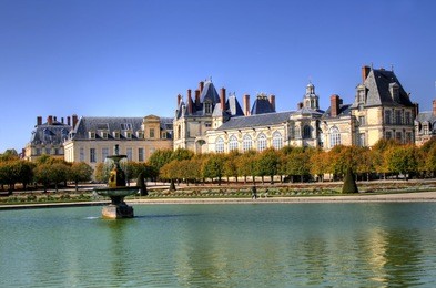 beautiful park with pond of ancient fontainebleau palace. palace of fontainebleau - one of the largest medieval royal chateaux in france (55 km from paris)