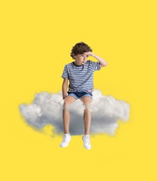 looking down. creative contemporary collage with little preschool boy sitting on white cloud and flying. concept of childhood, happiness, dreams, travels, ad. see the world by children's eyes