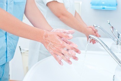 surgeon washing hands before operation
