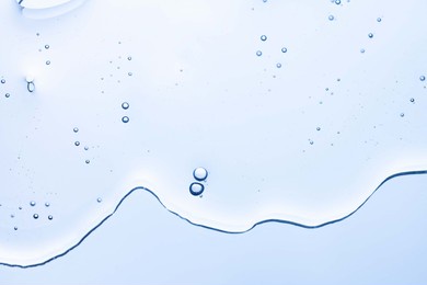 cream gel gray blue transparent cosmetic sample texture with bubbles isolated on white background