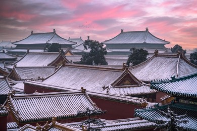 the scenery of the forbidden city after snow in winter