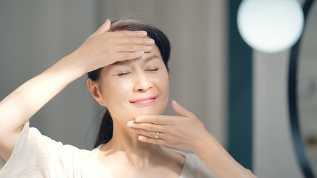 skin care concept of asian senior woman. anti aging. cosmetics.