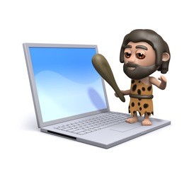 3d render of a caveman standing on a laptop pc