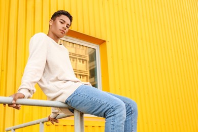 stylish young african-american man outdoors