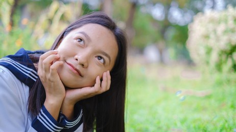 portrait student young girl in uniform school on at the garden, asian girl, teenager.