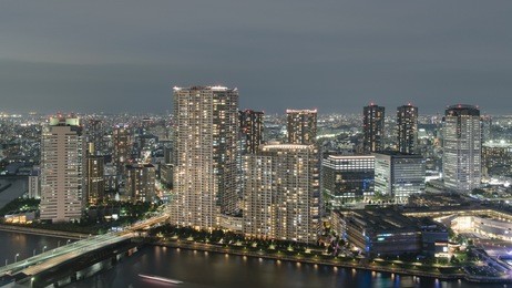 aerial view of tokyo city bay area at night with skyscrapers