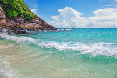 turquoise waves on the island of ko racha yai. thai phuket province