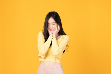 portrait of beautiful young asian girl model long hair in casual summer clothes smile, happy and enjoying in studio isolated on white background.