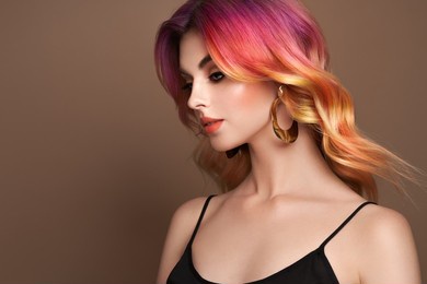 beauty fashion model woman with colorful dyed hair. girl with perfect makeup and hairstyle. model with perfect healthy dyed hair. care and beauty hair products