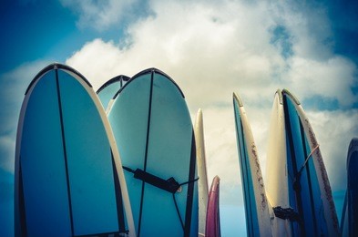 retro style photo of vintage hawaiian surf boards