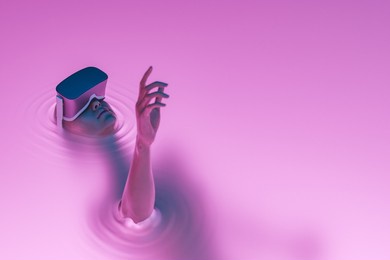surrealistic scene of a girl with vr glasses immersed in liquid with neon lighting. metaverse concept, nft, creative art and technology. 3d rendering