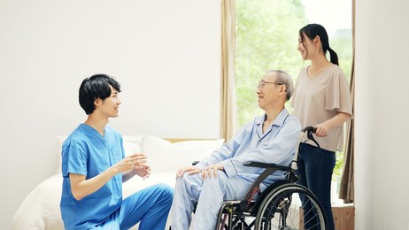 essential worker nursing a erderly man. nursing care.