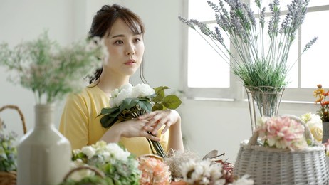 florist woman making flower arrangement. floral shop concept.