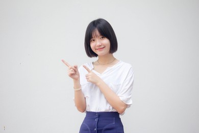asia thai teen white t-shirt beautiful girl pointing