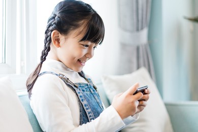 portrait of a girl using a phone