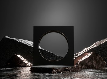 round rough stone pedestal. black cylinder in dark water. 3d render illustration. gold glitter decor design. empty base for product promotion. luxury golden mockup with rock shape podium