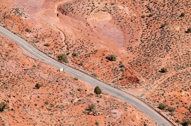 flying over desert road